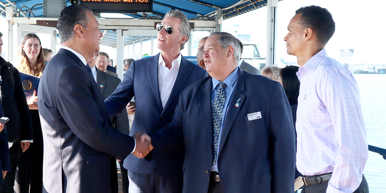 AC Transit's Board President Joel Young and GM Michael Hursh with Governor Gavin Newsome