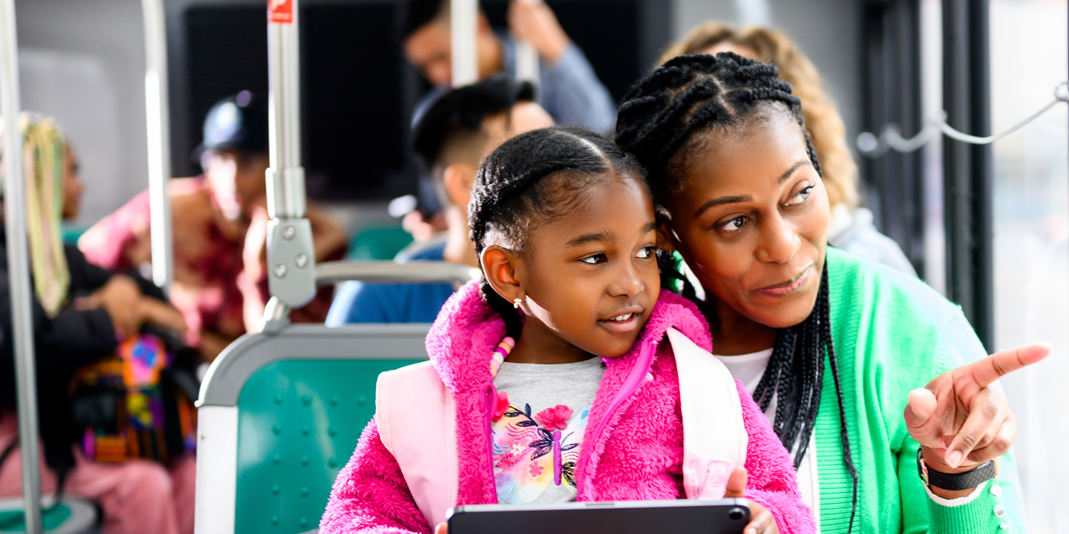 Mother with daughter on AC Transit bus