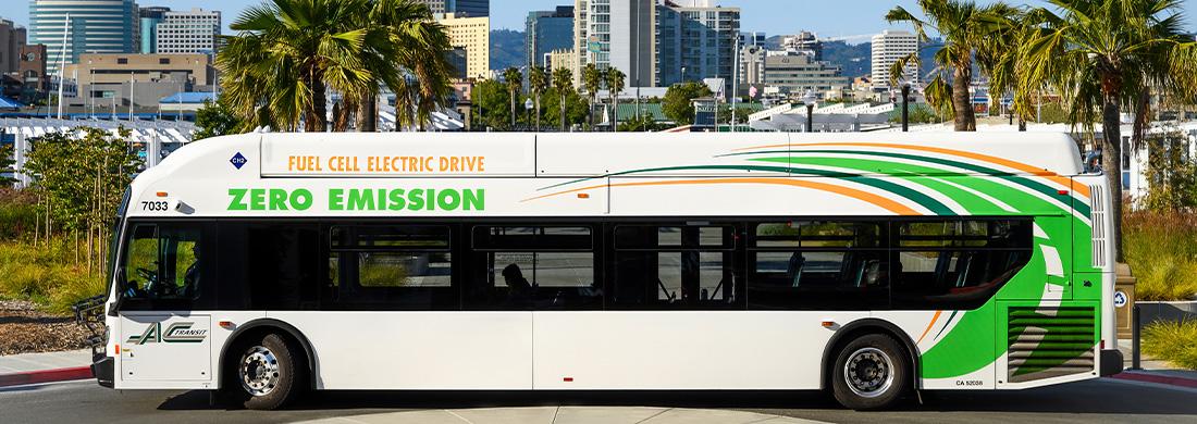 ZEB bus with Oakland Skyline