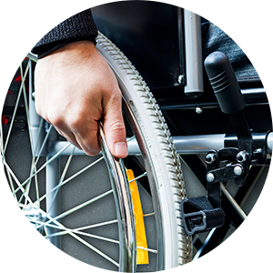Hand on a wheelchair